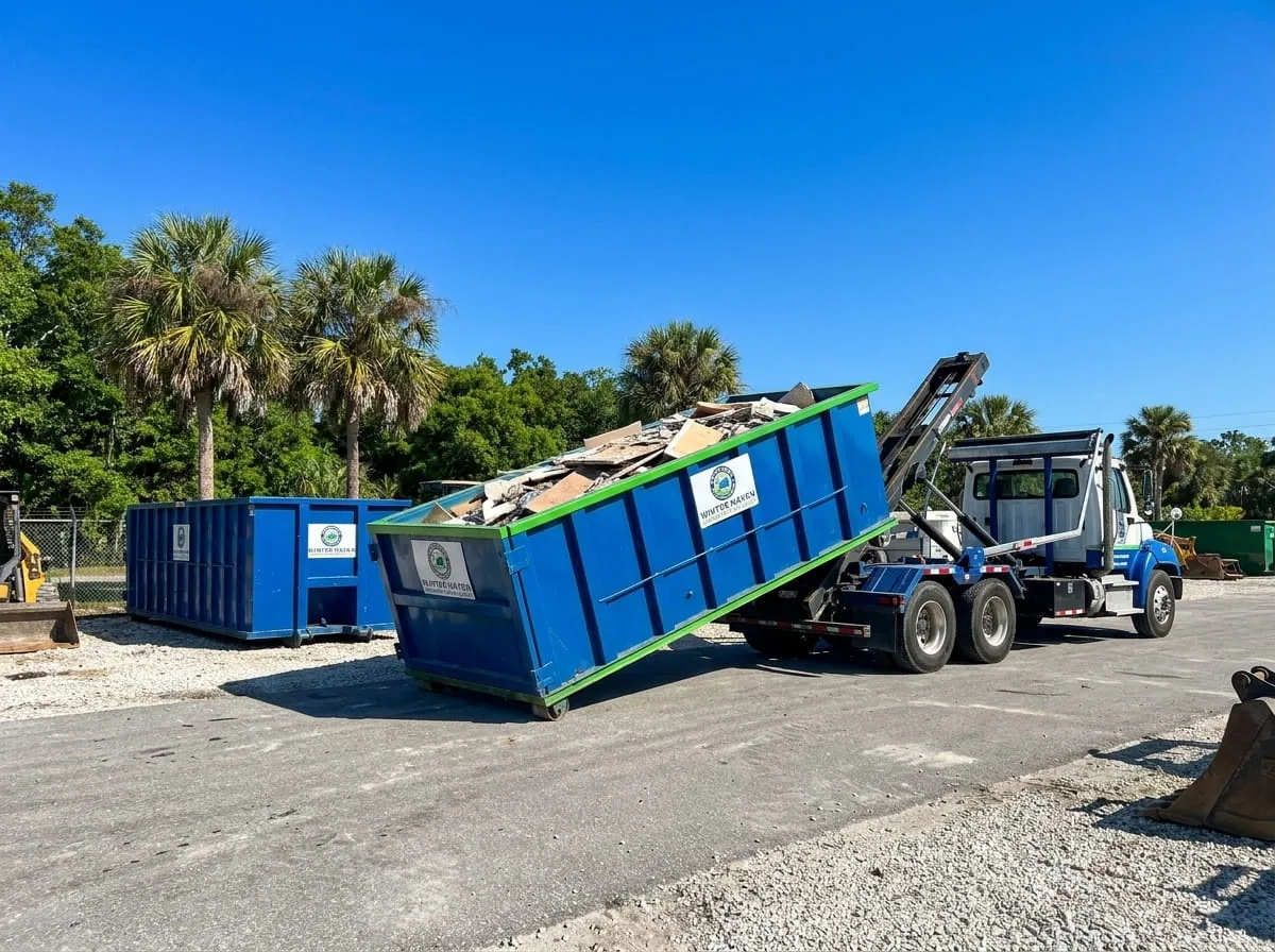 Roll-off dumpster placed carefully near a lakefront property in Winter Haven FL